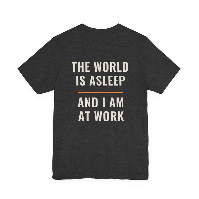 The World Is Asleep design printed on a dark grey heather unisex t-shirt.