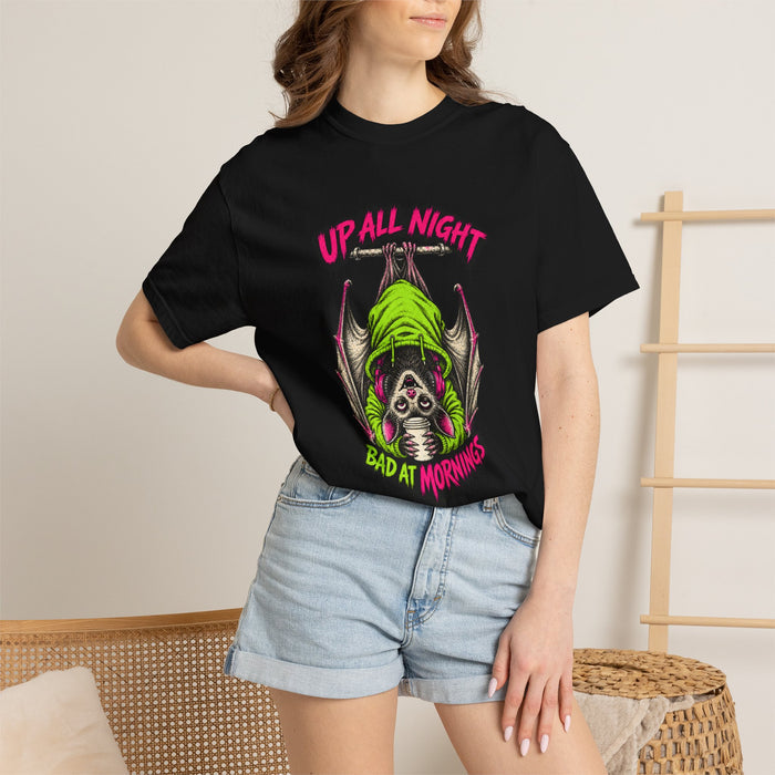A person wearing the black Up All Night Bat Tee t-shirt with denim shorts.