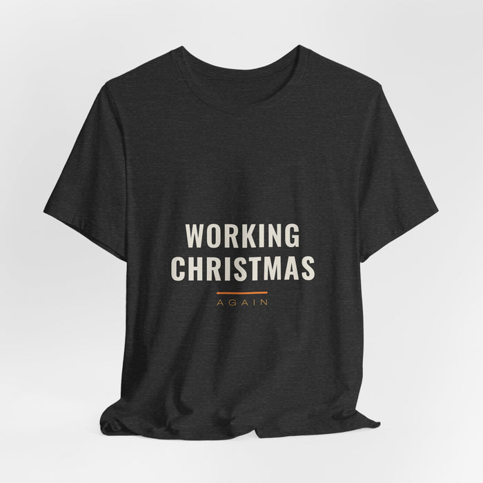 Dark grey heather Working Christmas t-shirt shown draped, front print visible.