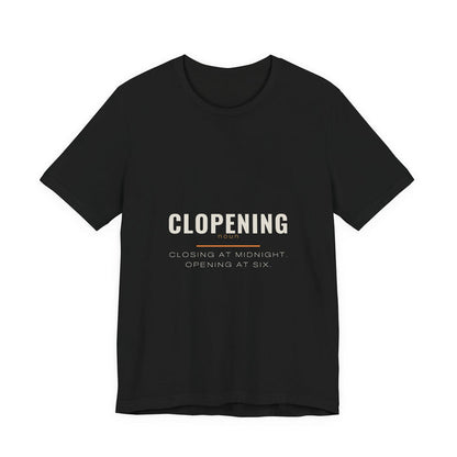 CLOPENING in cream capitals above an orange rule and the lines CLOSING AT MIDNIGHT, OPENING AT SIX, printed on a black unisex t-shirt.