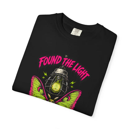 Black Found the Light Moth Tee t-shirt folded to show the front print at an angle.