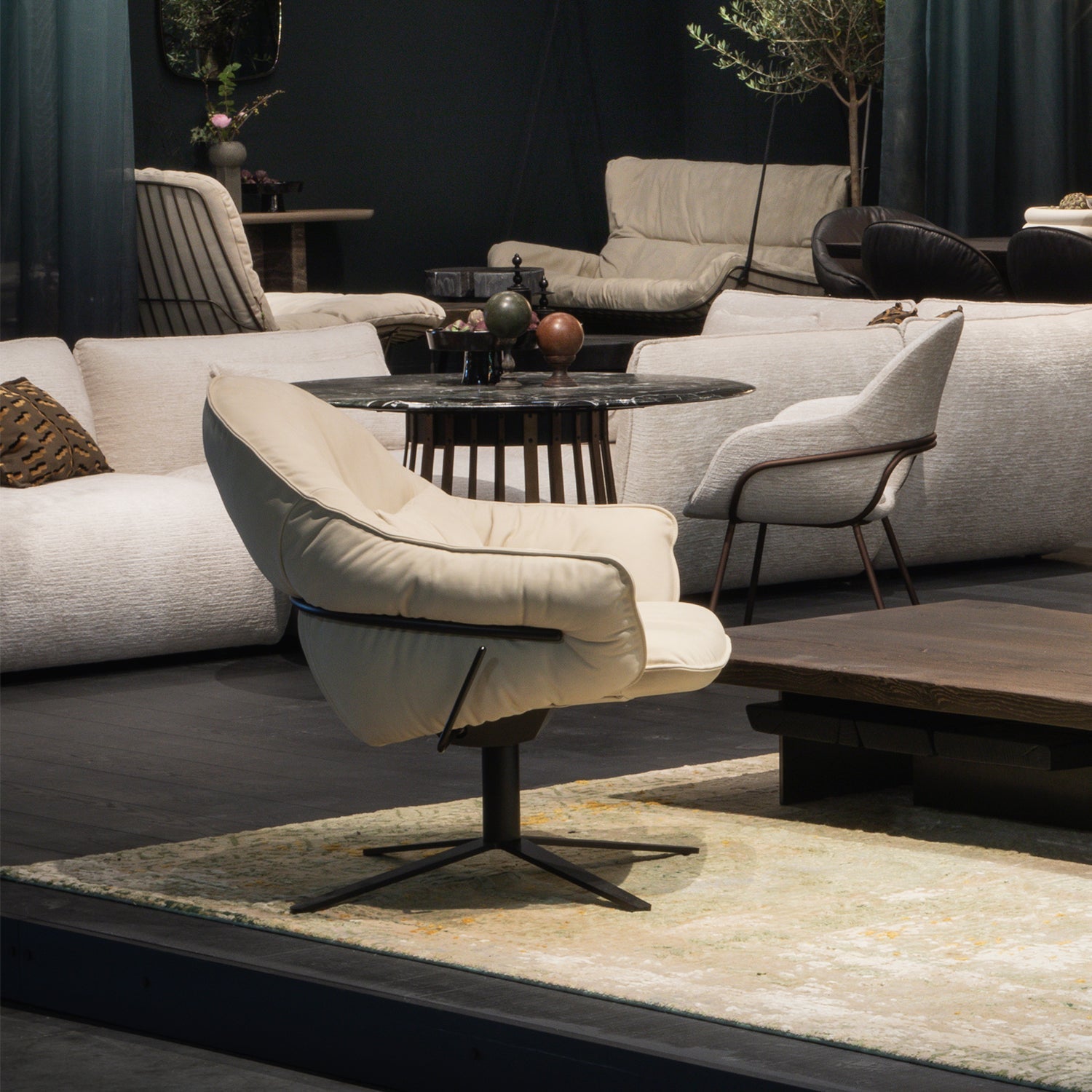 freifrau | marie lounge chair | x-base with rocker + tilting mechanism | adamo + eva tabacco + deep black frame