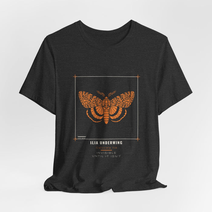 Dark grey heather Ilia Underwing t-shirt shown draped, front print visible.